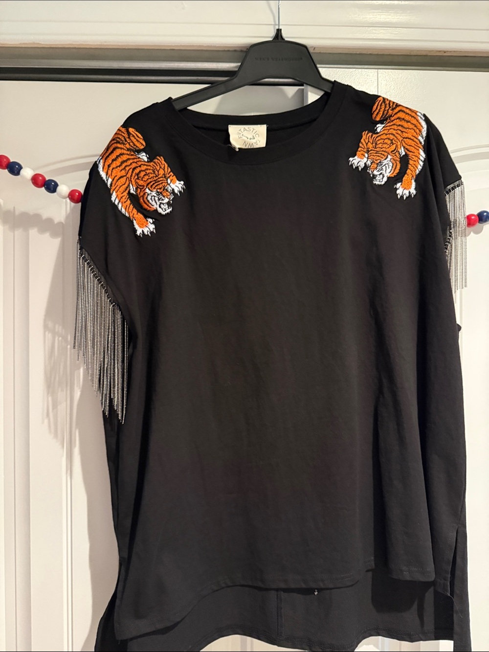 Fantastic Fawn Black Tee with embroidered tigers. Ball chain fringe. NWOT